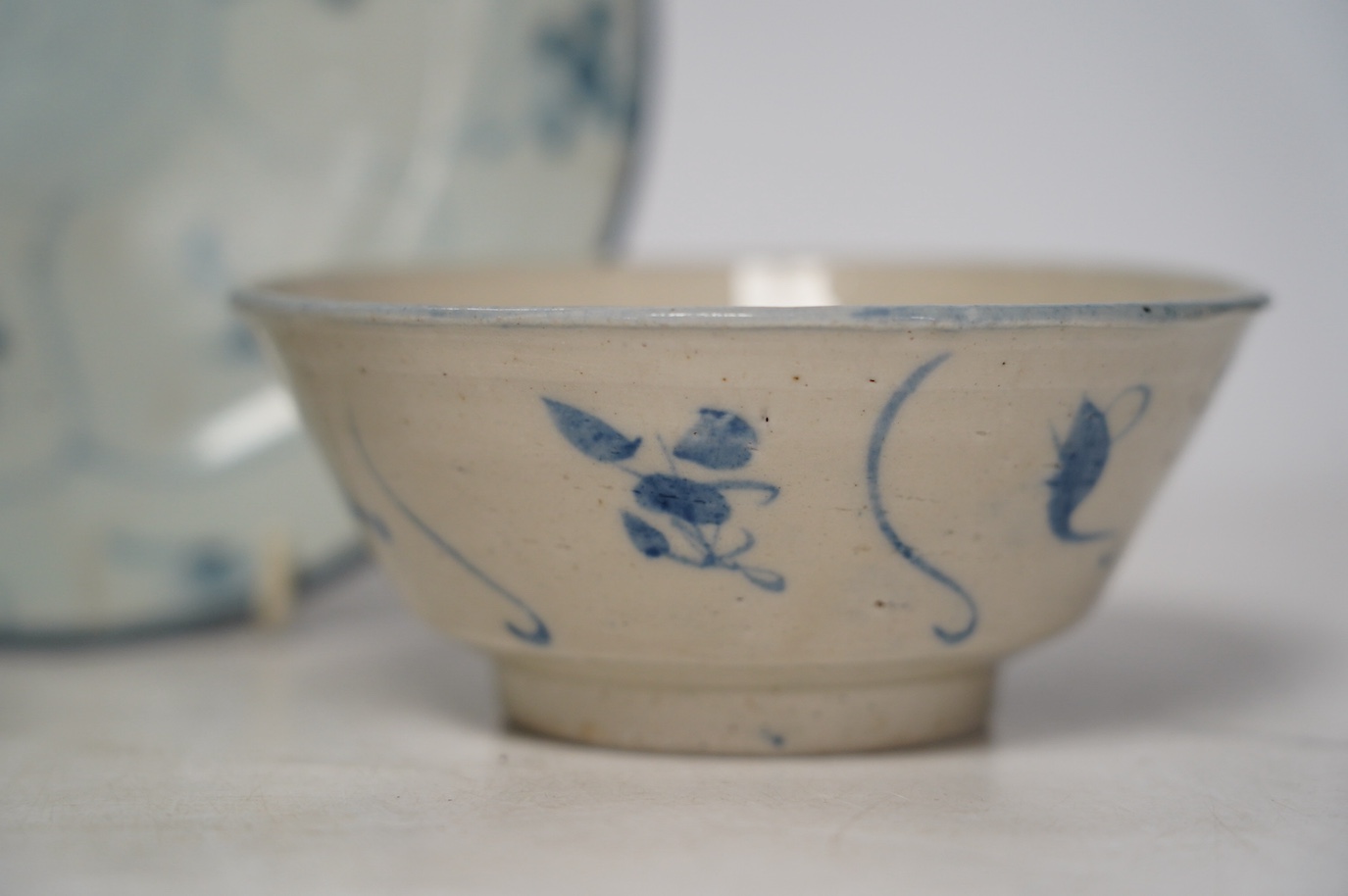 Three pieces of Chinese Teksing cargo comprising two bowls and a dish, largest 18.5cm. Condition - fair, hairline crack to dish